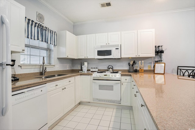 4868 Dahlia Ct Unit 202, Myrtle Beach, SC 29577 - kitchen with white appliances, ornamental molding, white cabinets, light tile patterned floors, and light countertops