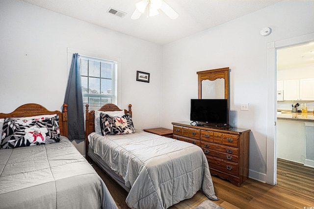 4868 Dahlia Ct Unit 202, Myrtle Beach, SC 29577 - bedroom with wood finished floors and a ceiling fan