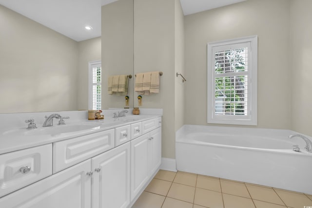 179 Cottage Ct, Pawleys Island, SC 29585 - full bathroom featuring plenty of natural light, tile patterned flooring, a bath, double vanity, and recessed lighting