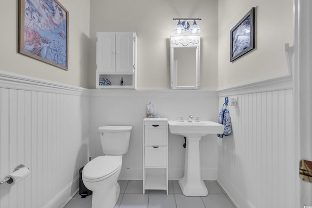 179 Cottage Ct, Pawleys Island, SC 29585 - bathroom with a wainscoted wall and tile patterned floors