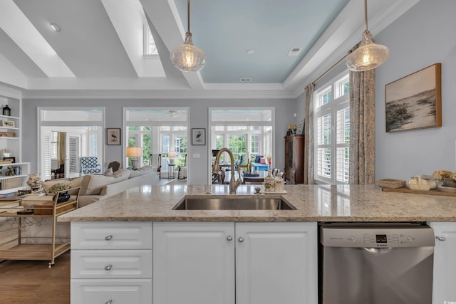 179 Cottage Ct, Pawleys Island, SC 29585 - kitchen featuring dishwasher, open floor plan, white cabinets, light stone countertops, and crown molding