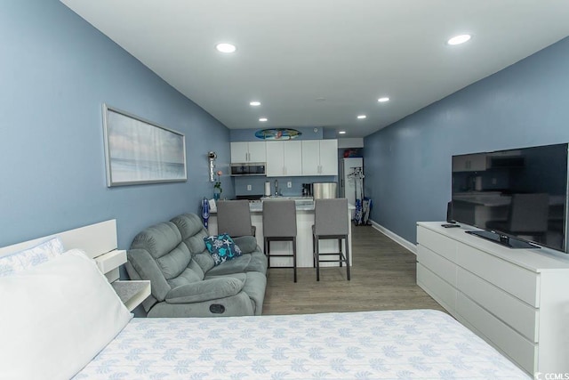 1207 S Ocean Blvd Unit 20403, Myrtle Beach, SC 29577 - bedroom featuring light wood-style floors and recessed lighting