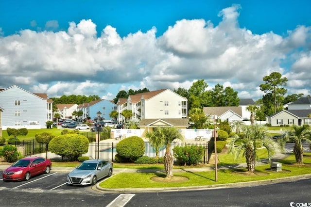 3681 Clay Pond Village Ln Unit 3103, Myrtle Beach, SC 29579 - uncovered parking lot featuring a residential view