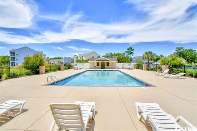 3681 Clay Pond Village Ln Unit 3103, Myrtle Beach, SC 29579 - community pool with a patio