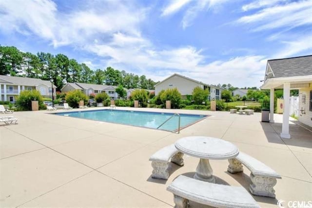 3681 Clay Pond Village Ln Unit 3103, Myrtle Beach, SC 29579 - community pool with a patio