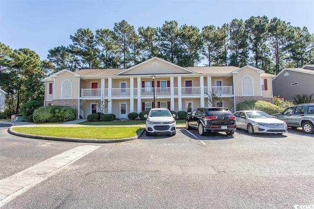 3681 Clay Pond Village Ln Unit 3103, Myrtle Beach, SC 29579 - view of building exterior with uncovered parking