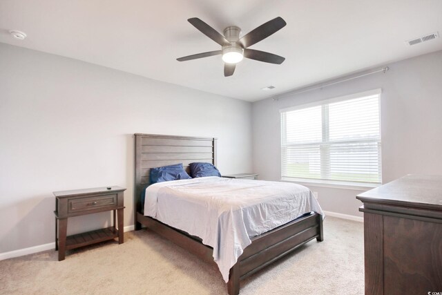 211 Seasons Trace Loop, Longs, SC 29568 - bedroom featuring light carpet and ceiling fan