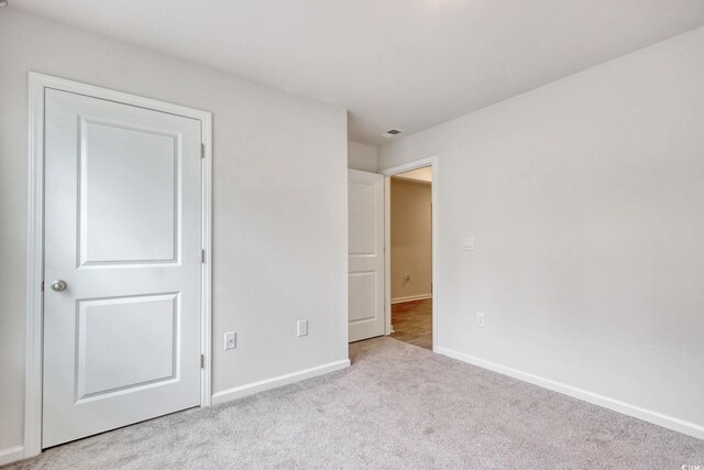 211 Seasons Trace Loop, Longs, SC 29568 - unfurnished bedroom featuring carpet floors and baseboards