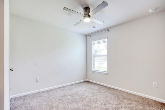 211 Seasons Trace Loop, Longs, SC 29568 - empty room featuring carpet flooring, a smoke detector, and a ceiling fan