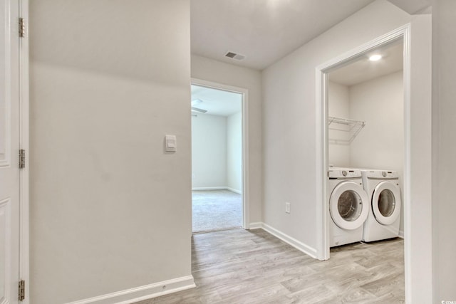211 Seasons Trace Loop, Longs, SC 29568 - washroom featuring washer and dryer and light wood-style flooring