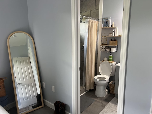 613 Todd Blvd, Conway, SC 29526 - bathroom with a stall shower and wood finished floors