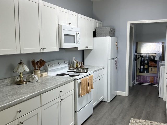613 Todd Blvd, Conway, SC 29526 - kitchen with white appliances, light countertops, white cabinetry, and wood finished floors