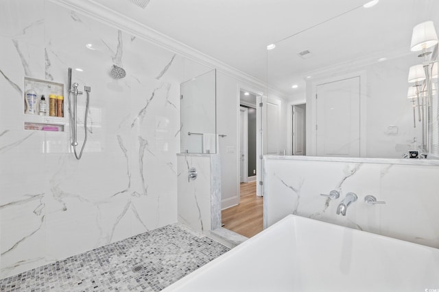 496 W Palm Dr, Myrtle Beach, SC 29579 - bathroom featuring crown molding, a freestanding tub, a marble finish shower, and recessed lighting