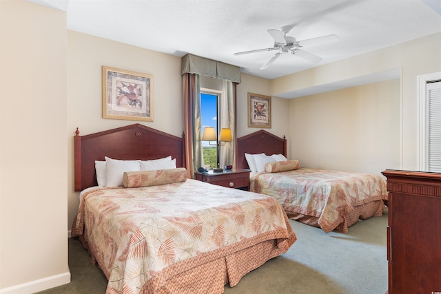 9994 Beach Club Dr Unit 1202, Myrtle Beach, SC 29572 - carpeted bedroom featuring ceiling fan and baseboards