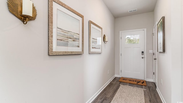 1407 Nokota Dr, Conway, SC 29526 - doorway to outside featuring dark wood-type flooring and baseboards