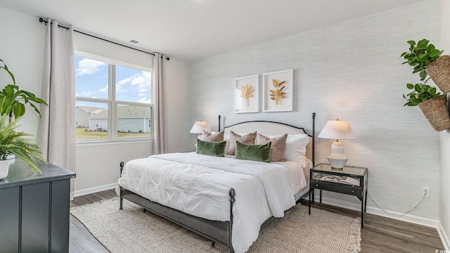 1407 Nokota Dr, Conway, SC 29526 - bedroom featuring wood finished floors and an accent wall