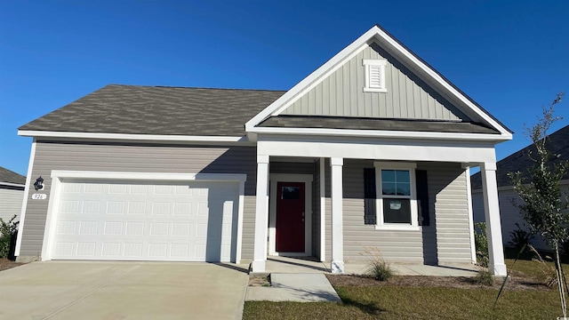 3550 Ashridge Way, Conway, SC 29526 - view of front of house featuring board and batten siding, a porch, an attached garage, concrete driveway, and a shingled roof