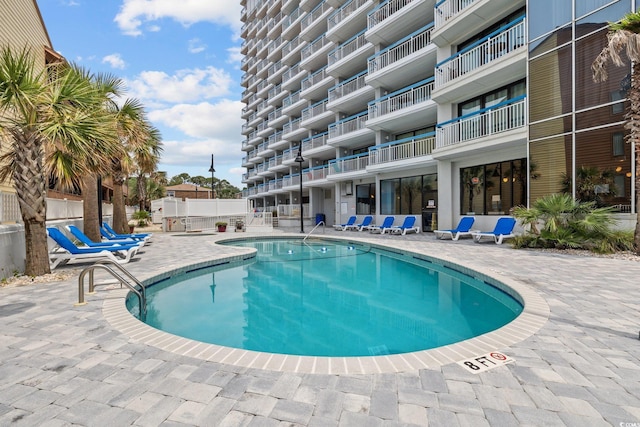 5511 N Ocean Blvd Unit 310, Myrtle Beach, SC 29577 - community pool featuring a patio
