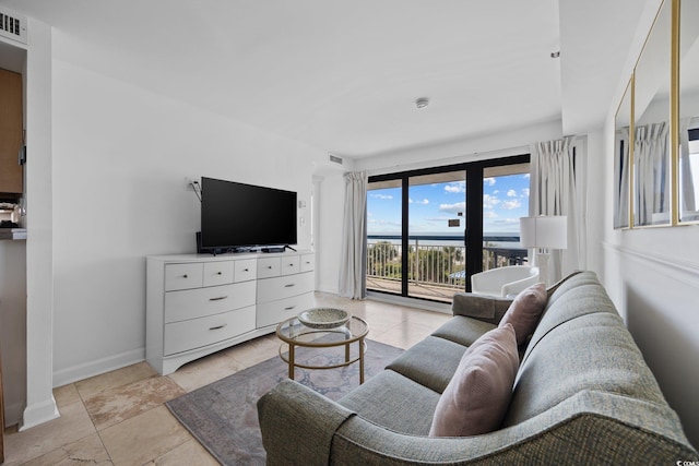 5511 N Ocean Blvd Unit 310, Myrtle Beach, SC 29577 - living room with baseboards