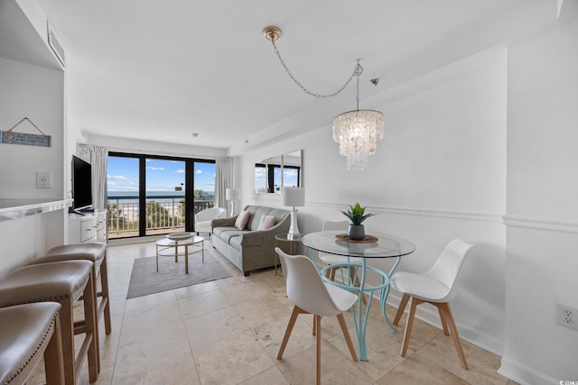 5511 N Ocean Blvd Unit 310, Myrtle Beach, SC 29577 - dining area with a chandelier