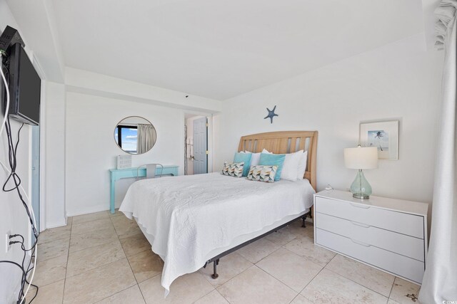 5511 N Ocean Blvd Unit 310, Myrtle Beach, SC 29577 - bedroom with light tile patterned floors