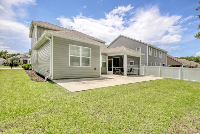 160 Juniata Loop, Little River, SC 29566 - back of house with a patio and a shingled roof