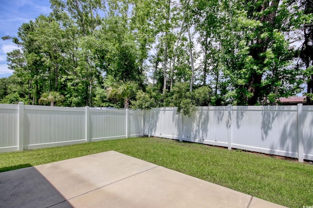 160 Juniata Loop, Little River, SC 29566 - fenced backyard featuring a patio