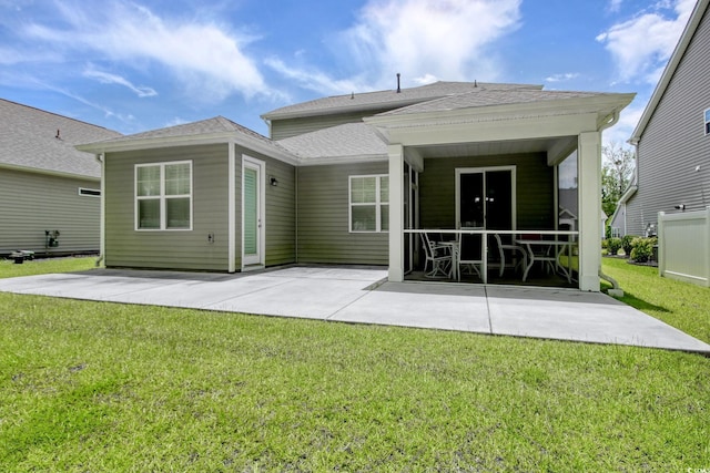 160 Juniata Loop, Little River, SC 29566 - back of property featuring a patio area, a yard, and roof with shingles