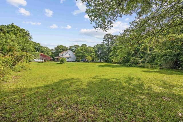 7288 Schooners Ct SW, Ocean Isle Beach, NC 28469 - view of grassy yard
