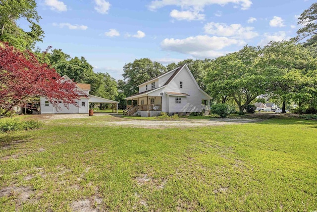 7288 Schooners Ct SW, Ocean Isle Beach, NC 28469 - view of home's exterior featuring a lawn and a porch