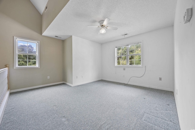 7288 Schooners Ct SW, Ocean Isle Beach, NC 28469 - carpeted empty room with ceiling fan and a textured ceiling