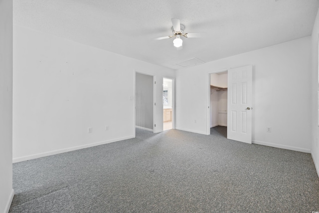 7288 Schooners Ct SW, Ocean Isle Beach, NC 28469 - unfurnished bedroom featuring carpet floors, a spacious closet, ceiling fan, and a closet