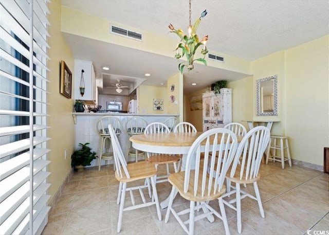10200 Beach Club Dr Unit 16F, Myrtle Beach, SC 29572 - dining room with light tile patterned flooring and baseboards