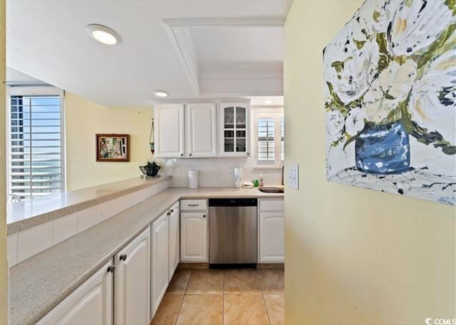 10200 Beach Club Dr Unit 16F, Myrtle Beach, SC 29572 - kitchen featuring dishwasher, a tray ceiling, white cabinetry, light countertops, and ornamental molding