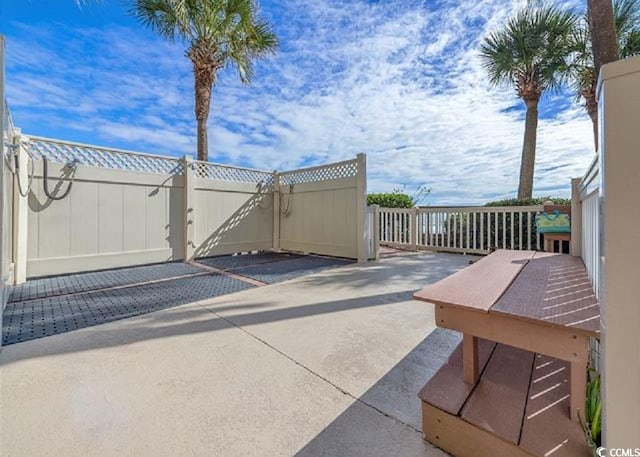 10200 Beach Club Dr Unit 16F, Myrtle Beach, SC 29572 - view of patio / terrace with a gate