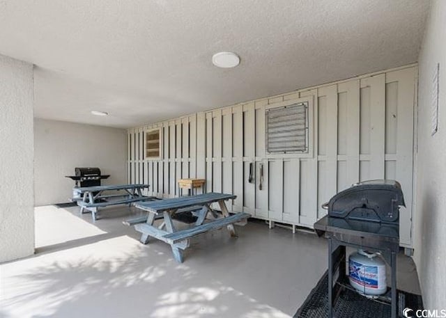 10200 Beach Club Dr Unit 16F, Myrtle Beach, SC 29572 - view of patio / terrace featuring a grill