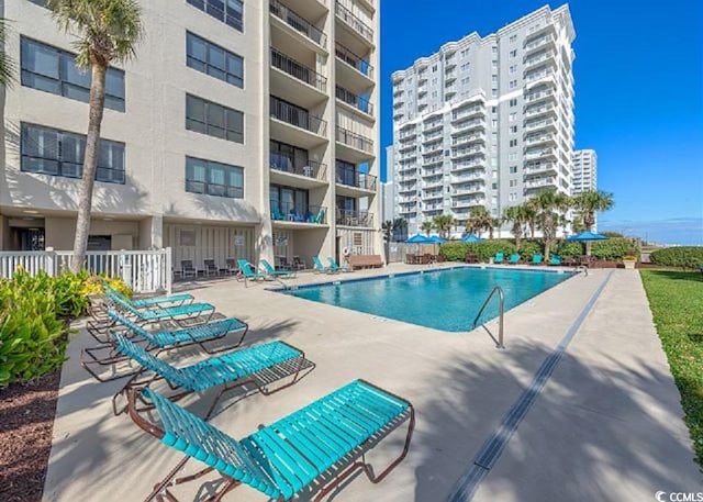 10200 Beach Club Dr Unit 16F, Myrtle Beach, SC 29572 - community pool with a patio