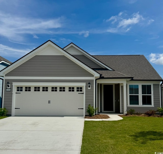 1514 Saw Palmetto St, North Myrtle Beach, SC 29582 - ranch-style home featuring a garage, driveway, a front yard, and a shingled roof