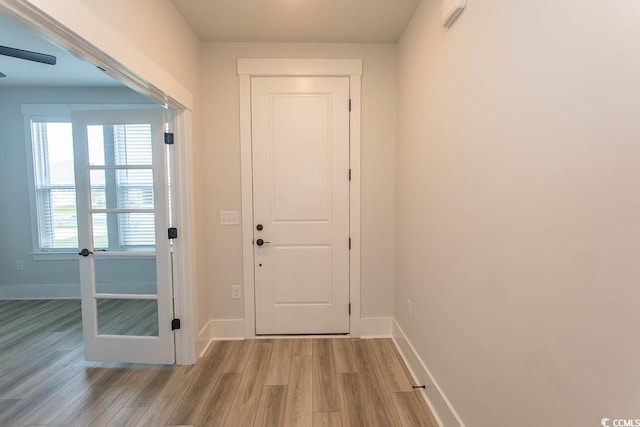1514 Saw Palmetto St, North Myrtle Beach, SC 29582 - doorway with wood finished floors and baseboards