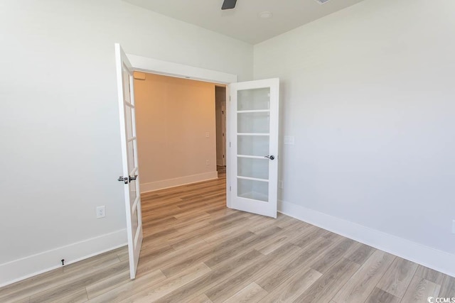 1514 Saw Palmetto St, North Myrtle Beach, SC 29582 - unfurnished room with french doors, light wood finished floors, and ceiling fan