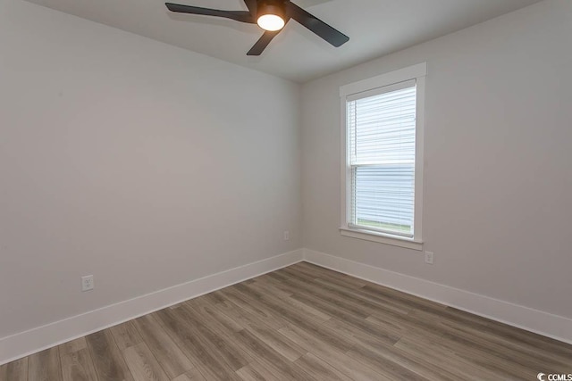 1514 Saw Palmetto St, North Myrtle Beach, SC 29582 - spare room with wood finished floors and ceiling fan