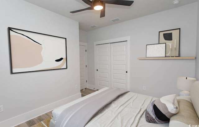 1514 Saw Palmetto St, North Myrtle Beach, SC 29582 - bedroom featuring wood finished floors, a closet, and a ceiling fan