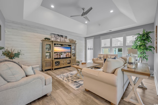 2336 Tidewatch Way N, Myrtle Beach, SC 29582 - living area with a tray ceiling, a ceiling fan, light wood finished floors, recessed lighting, and wooden walls