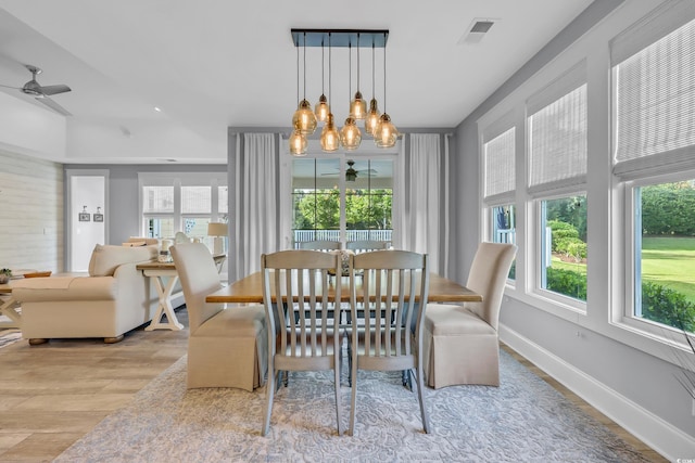 2336 Tidewatch Way N, Myrtle Beach, SC 29582 - dining space featuring ceiling fan, wood finished floors, and a chandelier