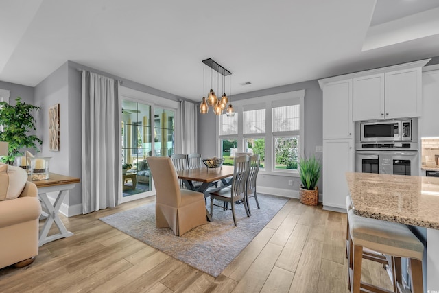 2336 Tidewatch Way N, Myrtle Beach, SC 29582 - dining area featuring a chandelier and light wood-style flooring