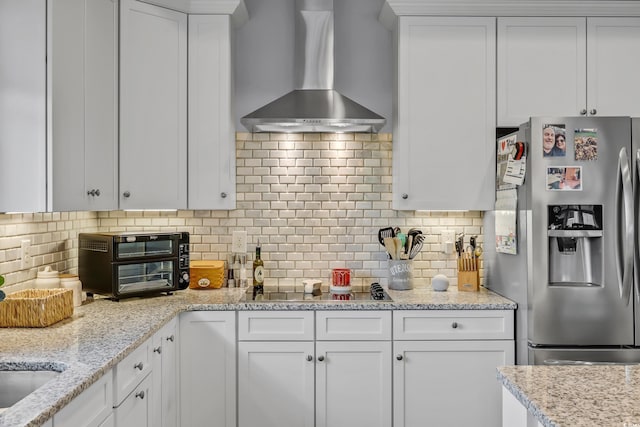 2336 Tidewatch Way N, Myrtle Beach, SC 29582 - kitchen with stainless steel refrigerator with ice dispenser, wall chimney exhaust hood, white cabinets, and backsplash