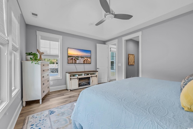 2336 Tidewatch Way N, Myrtle Beach, SC 29582 - bedroom featuring light wood-style floors and a ceiling fan