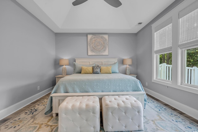 2336 Tidewatch Way N, Myrtle Beach, SC 29582 - bedroom with wood finished floors, a tray ceiling, and ceiling fan