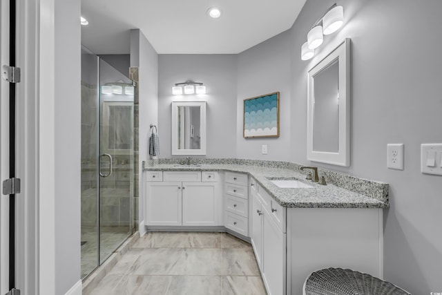 2336 Tidewatch Way N, Myrtle Beach, SC 29582 - full bath with double vanity, a shower stall, marble look tiles, and recessed lighting