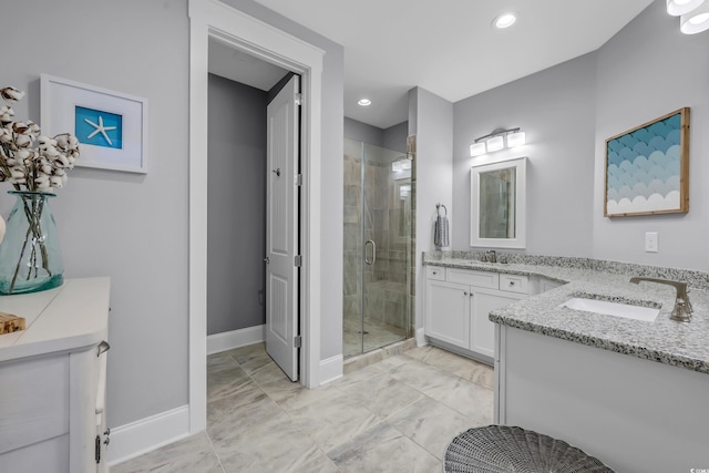 2336 Tidewatch Way N, Myrtle Beach, SC 29582 - full bathroom with a stall shower, two vanities, marble look tiles, and recessed lighting